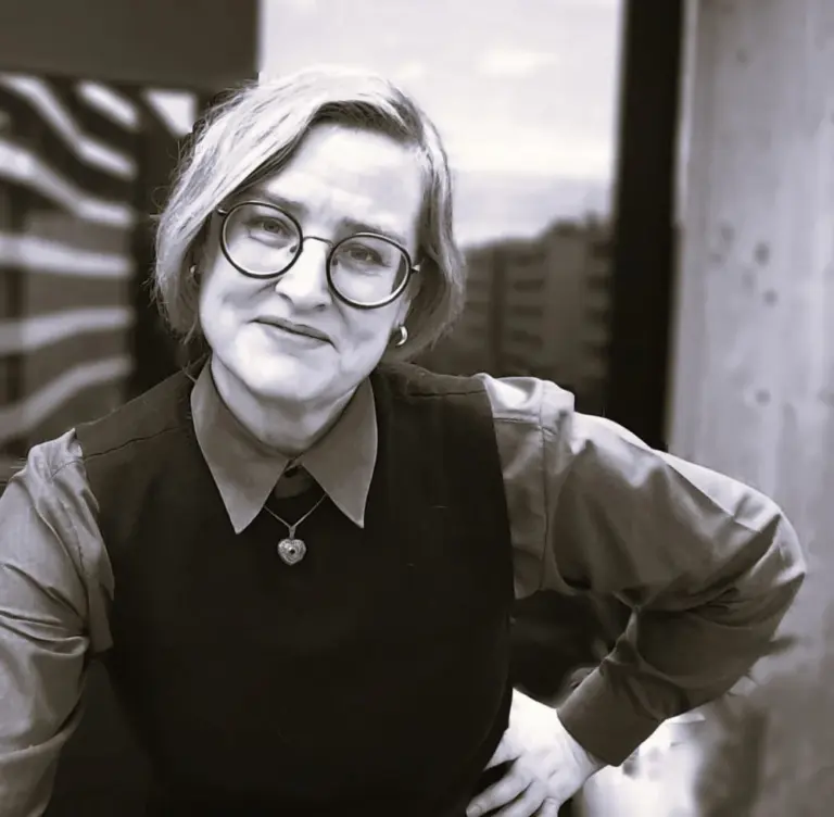 Black and white portrait photograph of Penny Maxwell, consultant pharmacist and founder of Maxwell Minds